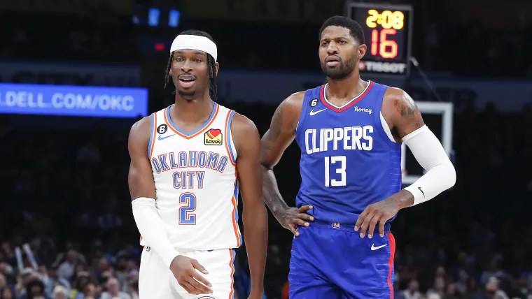 Shai Gilgeous-Alexander and Paul George during a game in 2022